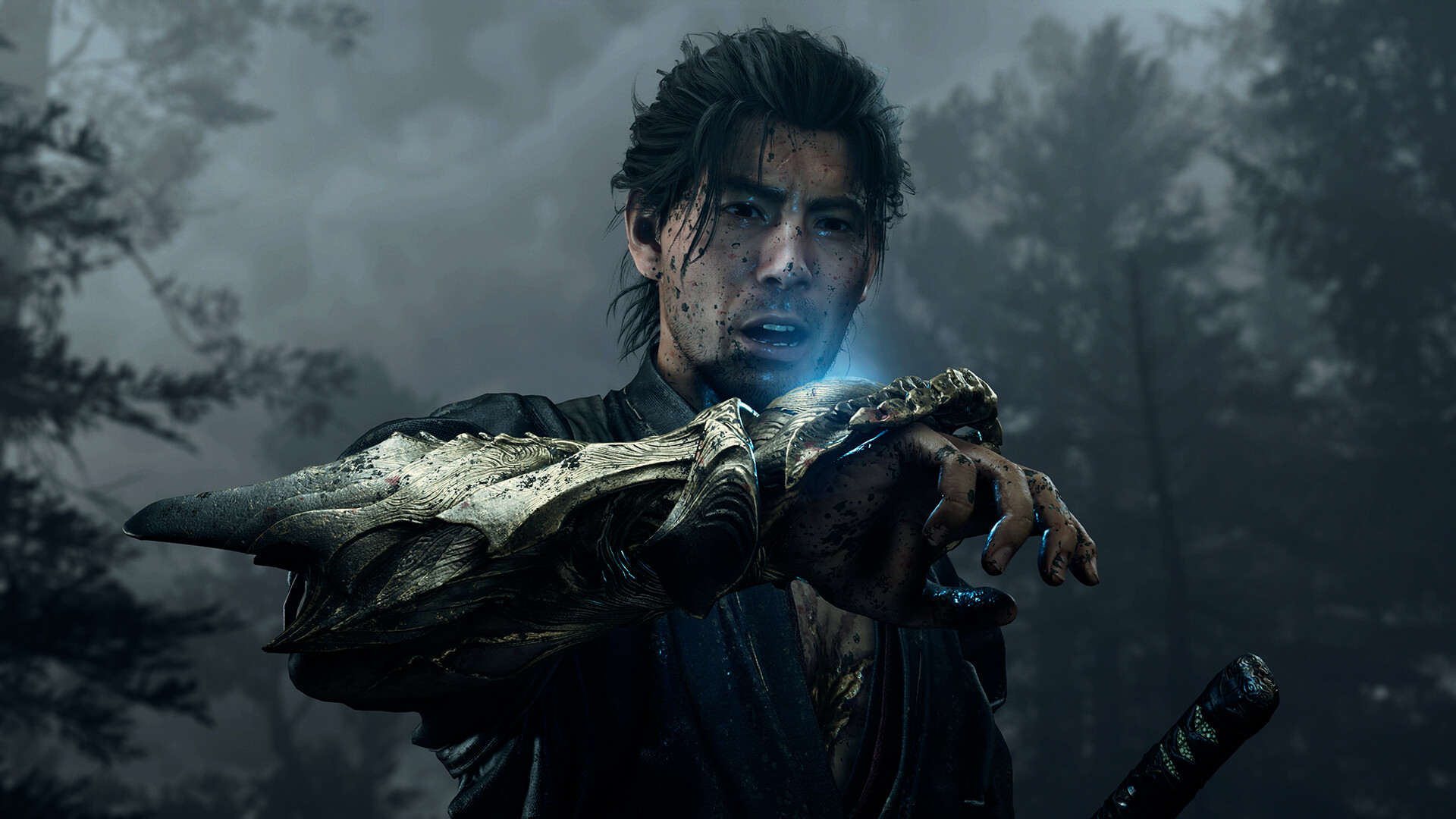 Close-up of Musashi's blood-splattered face as the engraved Oni Gauntlet crosses the frame, its knuckles glowing blue in a grey forest.